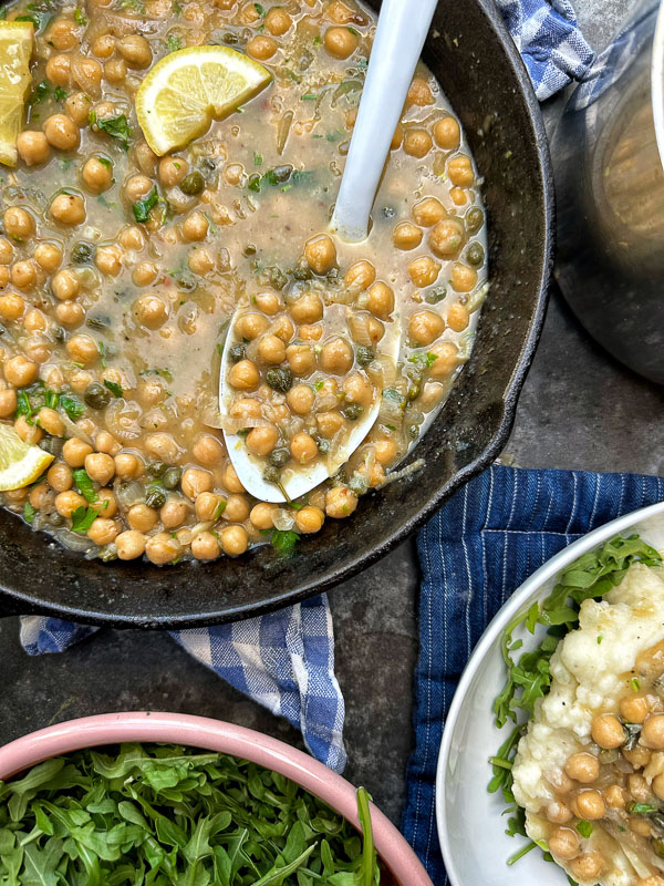 Bright, bold, and comforting—Shutterbean’s Chickpea Piccata is served over creamy mashed potatoes with a generous handful of peppery arugula. A fast, flavorful, plant-based dinner loaded with lemon, garlic, and capers. Perfect for a cozy weeknight meal that feels like a restaurant dish.