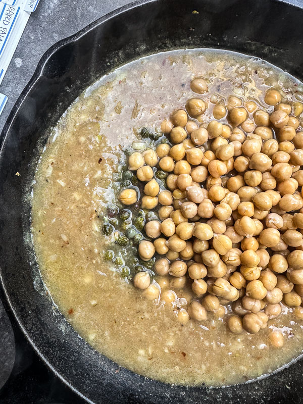 Bright, bold, and comforting—Shutterbean’s Chickpea Piccata is served over creamy mashed potatoes with a generous handful of peppery arugula. A fast, flavorful, plant-based dinner loaded with lemon, garlic, and capers. Perfect for a cozy weeknight meal that feels like a restaurant dish.