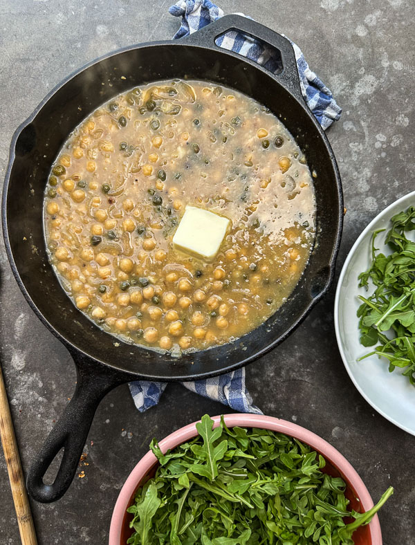 Bright, bold, and comforting—Shutterbean’s Chickpea Piccata is served over creamy mashed potatoes with a generous handful of peppery arugula. A fast, flavorful, plant-based dinner loaded with lemon, garlic, and capers. Perfect for a cozy weeknight meal that feels like a restaurant dish.