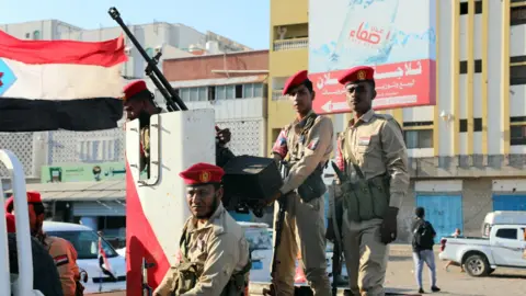 EPA Southern Transitional Council (STC) forces patrol during a rally calling for South Yemen's independence, in the southern port city of Aden, Yemen (25 December 2025)